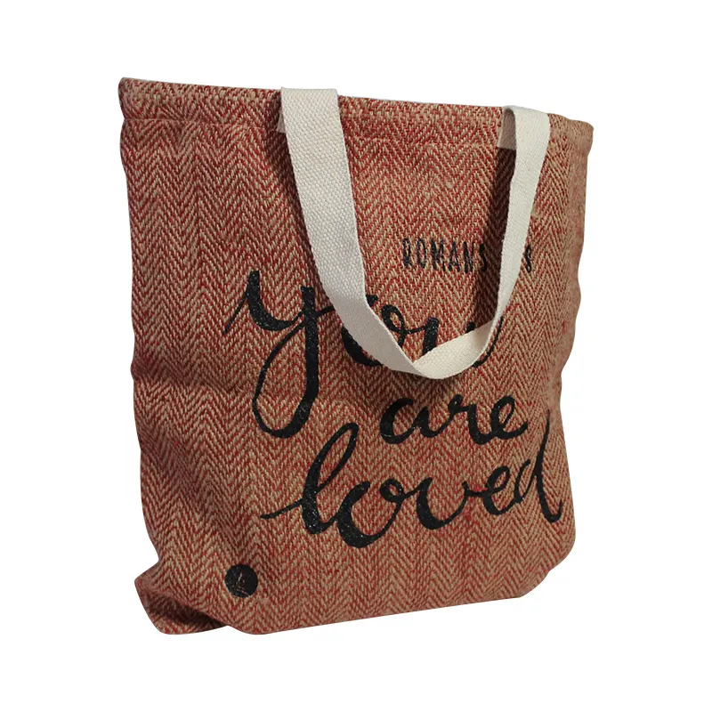 Juca bag van geweven jute met canvas draaglussen, rood