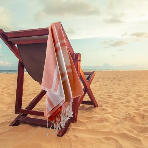 Gestreepte katoenen stranddoek Fouta met pouch