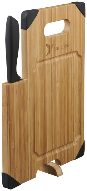 Bamboe snijplank met ingebouwd mes naast een geschenkdoos