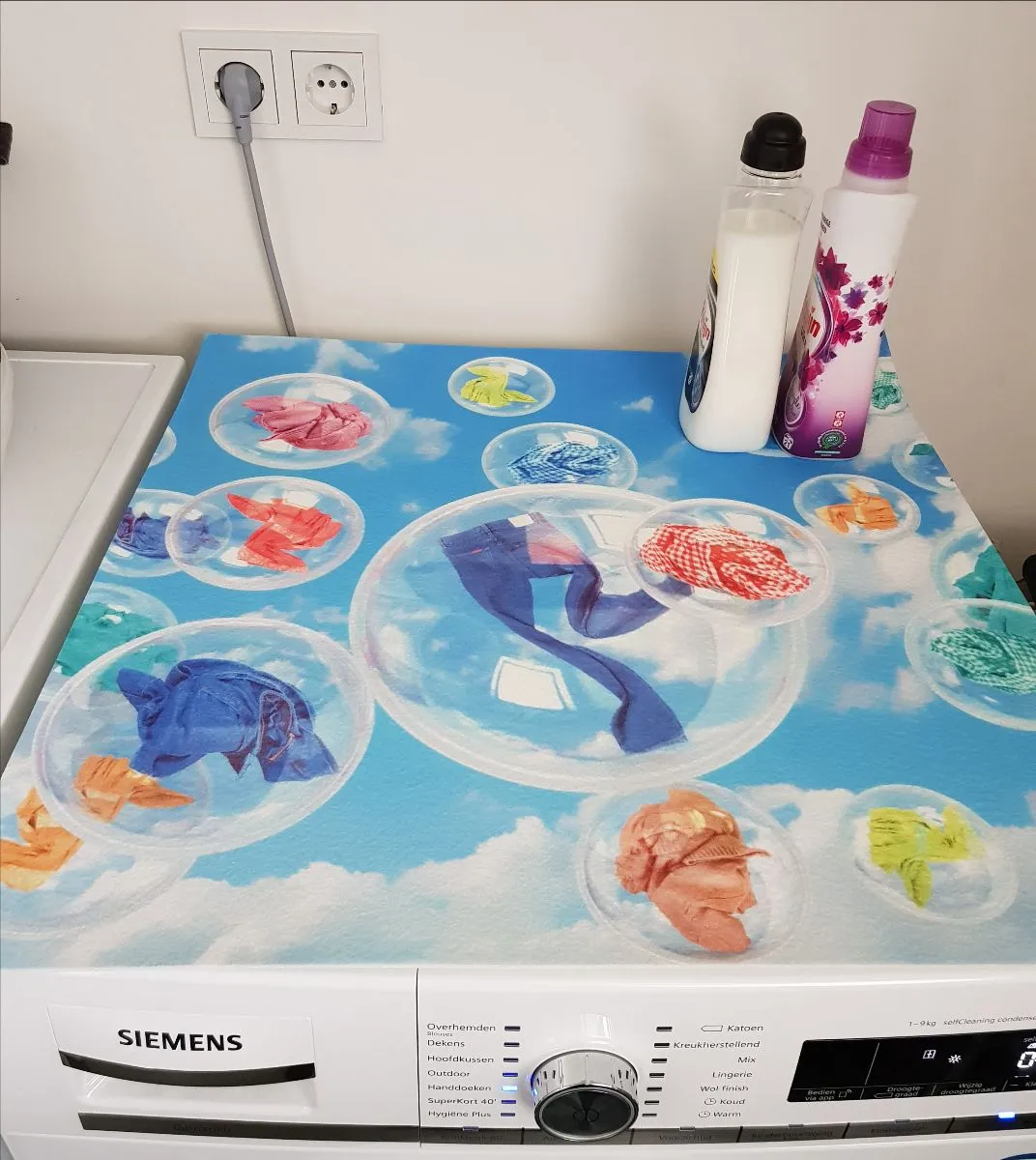 Vierkante full colour bedrukte mat op een wasmachine