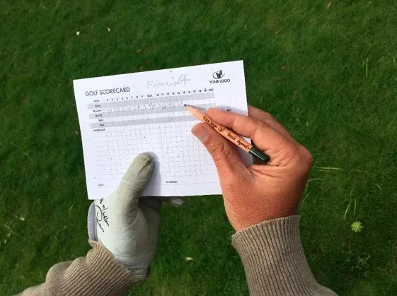 Golfpotlood en groeipapier scorekaart