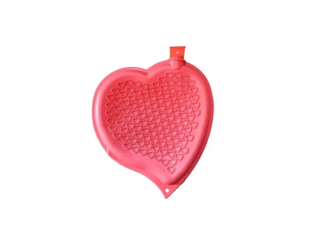 Rode hartvormige warmwaterkruik van rubber
