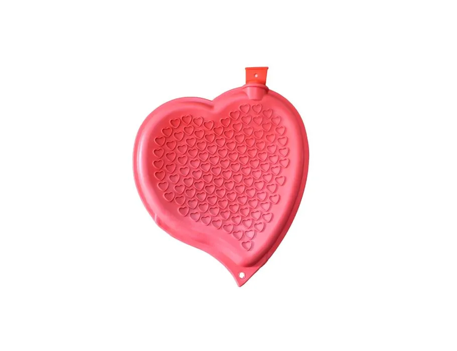 Rode hartvormige warmwaterkruik van rubber